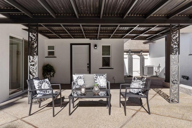 view of patio / terrace featuring an outdoor living space and central air condition unit