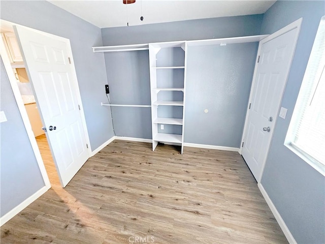 unfurnished bedroom featuring light wood-type flooring