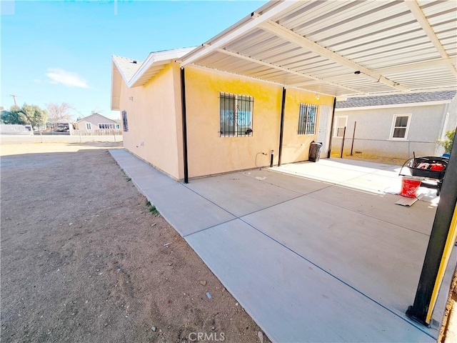 exterior space with a patio area