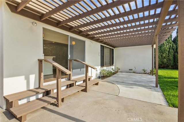 view of patio featuring a pergola