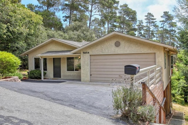 ranch-style house with a garage