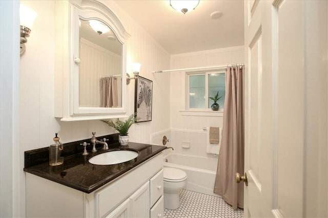 full bathroom featuring toilet, vanity, and shower / tub combo with curtain