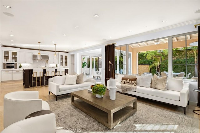 living room with ornamental molding