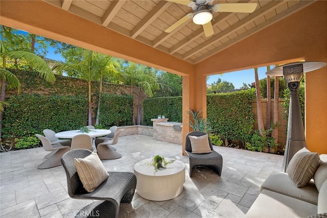 view of patio featuring ceiling fan