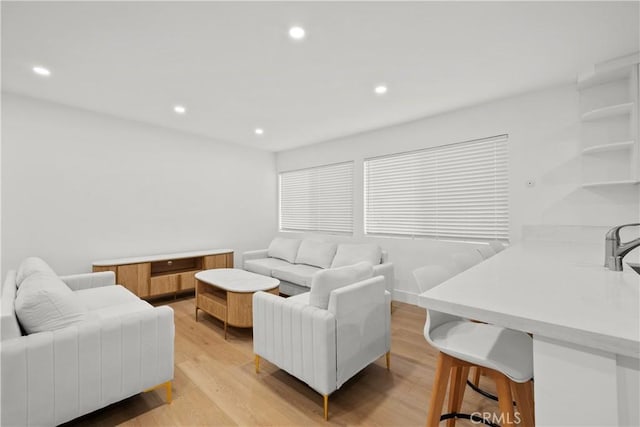 living room featuring light wood-type flooring