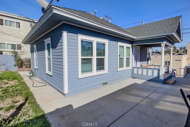 view of home's exterior with a patio