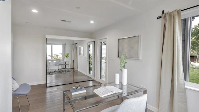 interior space with hardwood / wood-style floors