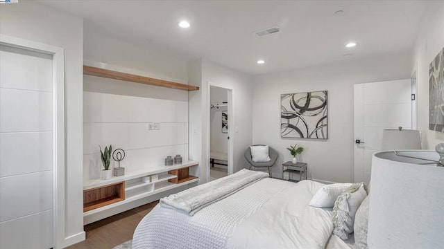 bedroom featuring dark hardwood / wood-style floors