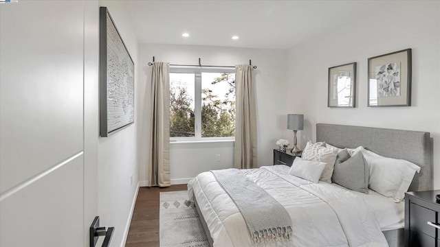 bedroom featuring dark wood-type flooring