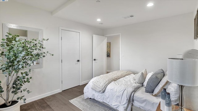 bedroom featuring dark hardwood / wood-style floors