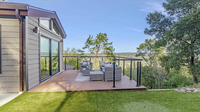 wooden deck with an outdoor living space and a yard