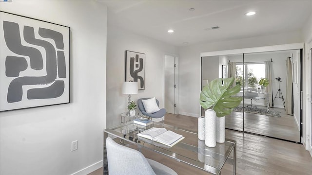 home office featuring hardwood / wood-style floors