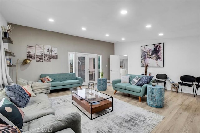 living room with light hardwood / wood-style floors