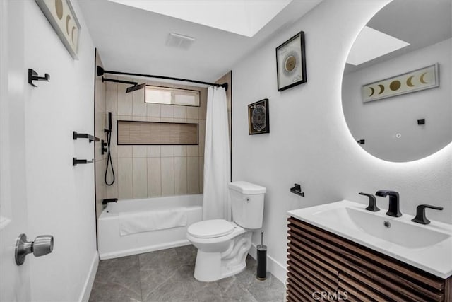 full bathroom featuring toilet, vanity, tile patterned floors, and shower / bath combo