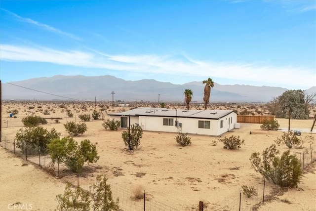 property view of mountains featuring a rural view