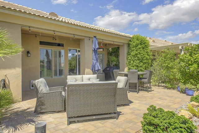 view of patio featuring an outdoor living space and area for grilling