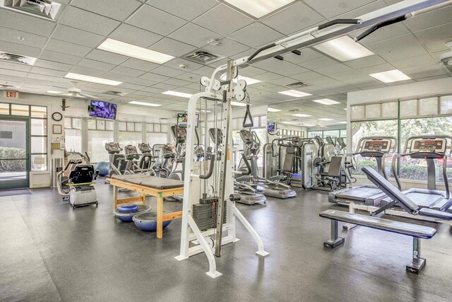 gym with a drop ceiling