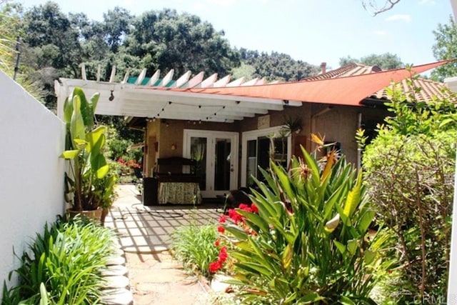 rear view of house with a patio area