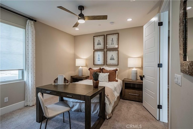 carpeted bedroom featuring ceiling fan