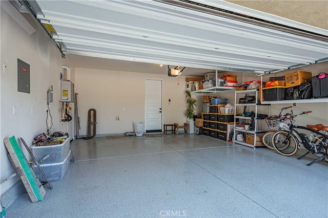 garage with a garage door opener and electric panel