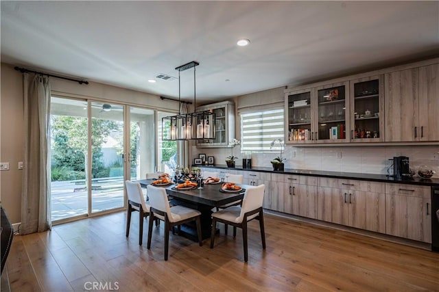 dining room with light hardwood / wood-style floors