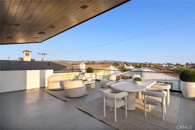 view of patio / terrace with a balcony