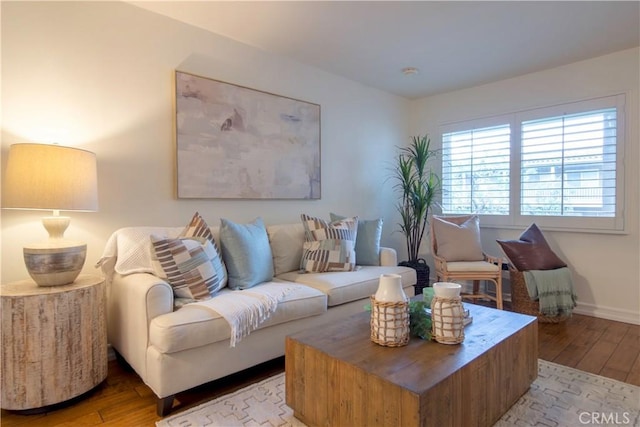 living room with light hardwood / wood-style flooring