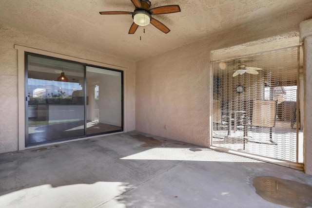 view of patio / terrace featuring ceiling fan