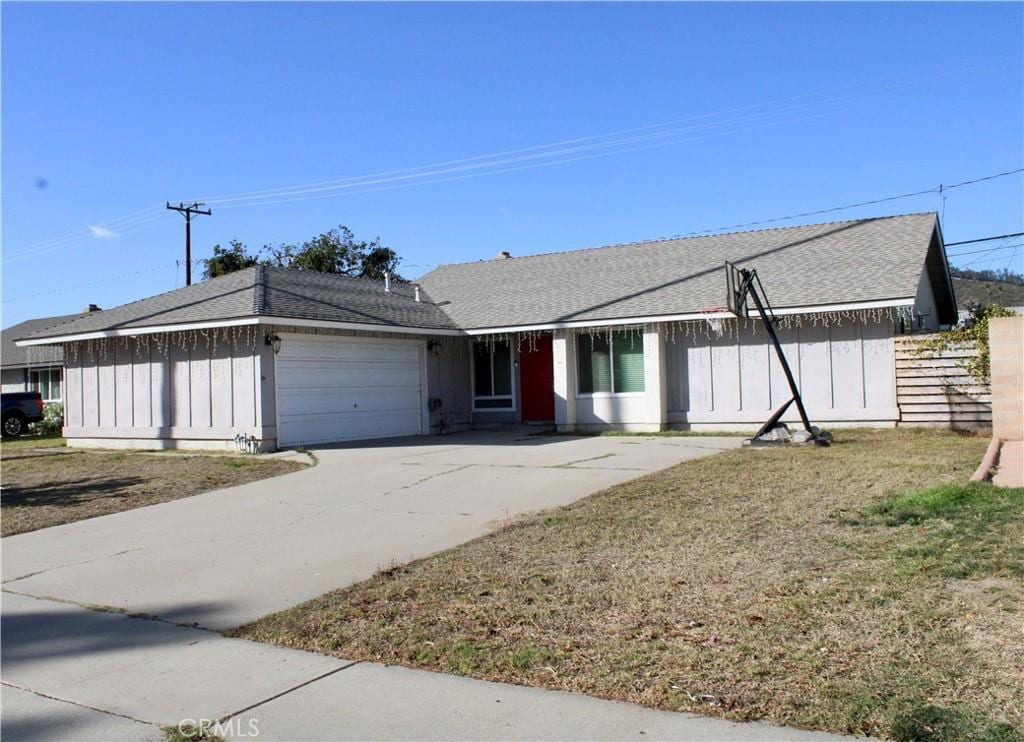 single story home with a garage