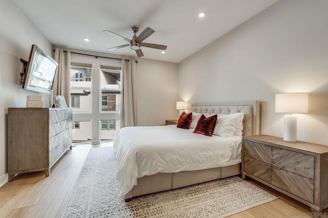 bedroom with ceiling fan and light wood-type flooring