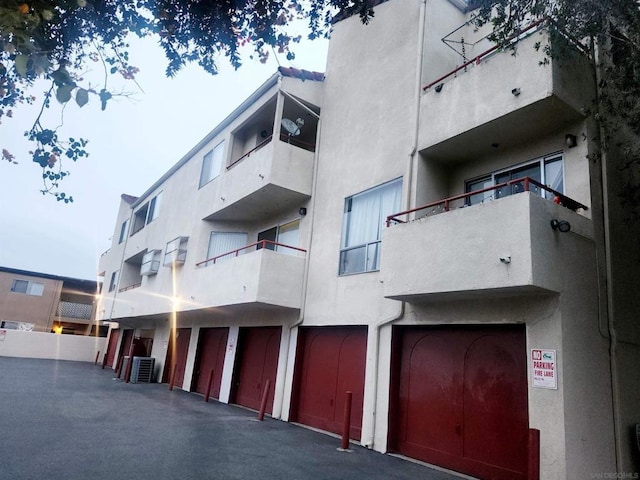 view of building exterior with cooling unit