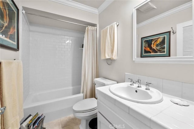 full bathroom featuring tile patterned flooring, vanity, toilet, ornamental molding, and shower / bath combo with shower curtain