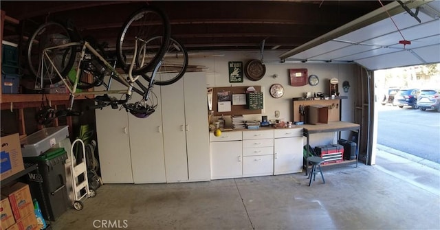 garage with a workshop area