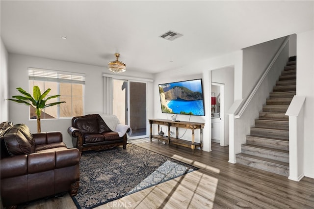 living room with dark hardwood / wood-style floors