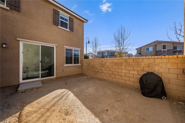 view of patio with a grill