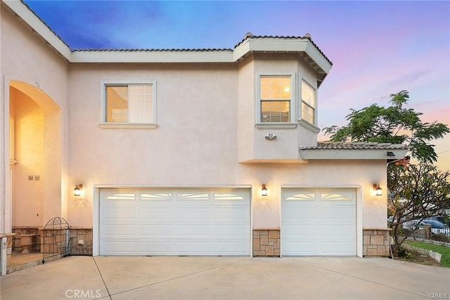 view of front of house with a garage