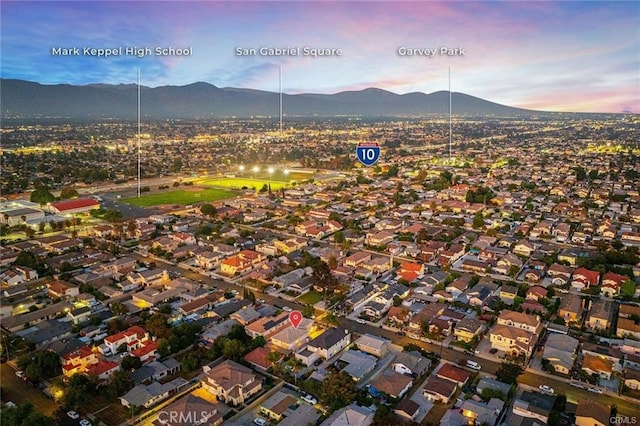 aerial view at dusk with a mountain view