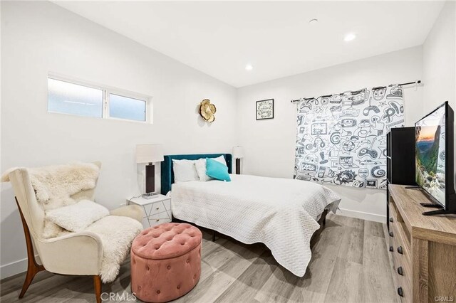 bedroom featuring light hardwood / wood-style flooring