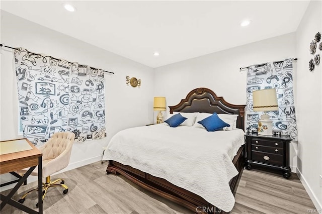 bedroom with light hardwood / wood-style floors