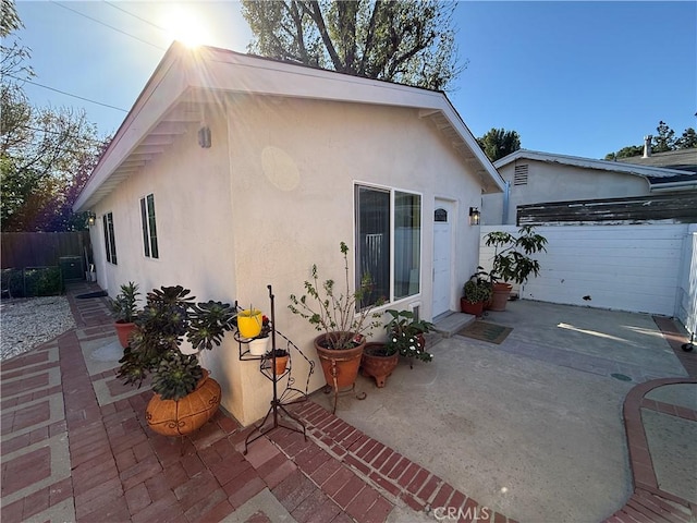 rear view of house with a patio