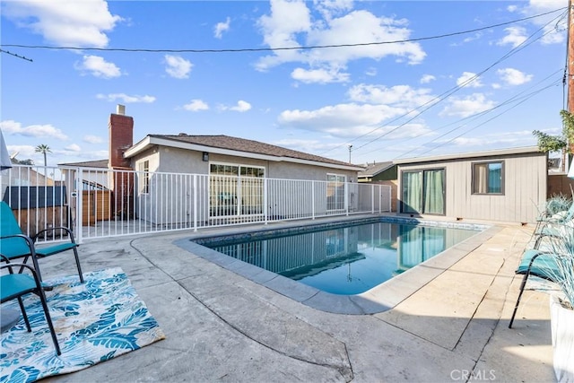 view of pool featuring a patio area