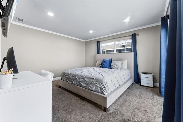 carpeted bedroom with ornamental molding