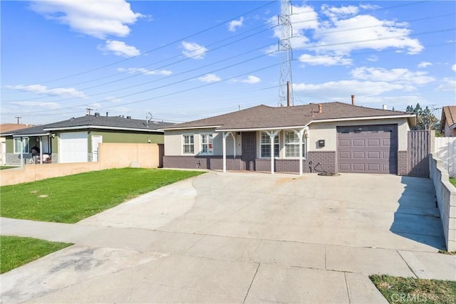 ranch-style home with a front lawn and a garage