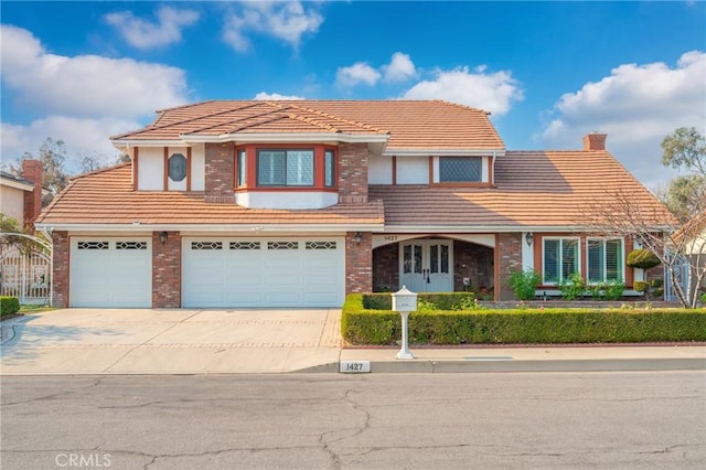 view of front of property with a garage