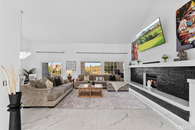 living room with a notable chandelier