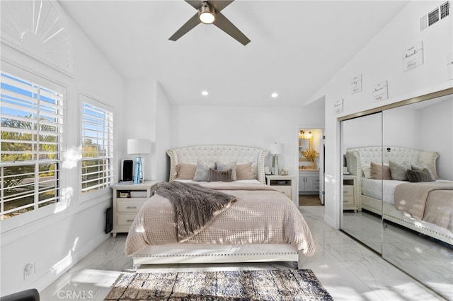 bedroom featuring ceiling fan and a closet