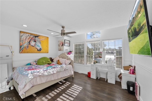 bedroom with ceiling fan and dark hardwood / wood-style flooring