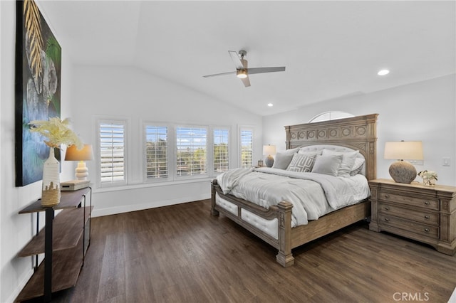 bedroom featuring ceiling fan, dark wood-type flooring, and lofted ceiling