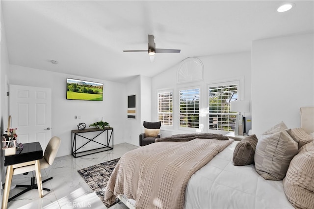 bedroom featuring ceiling fan and lofted ceiling