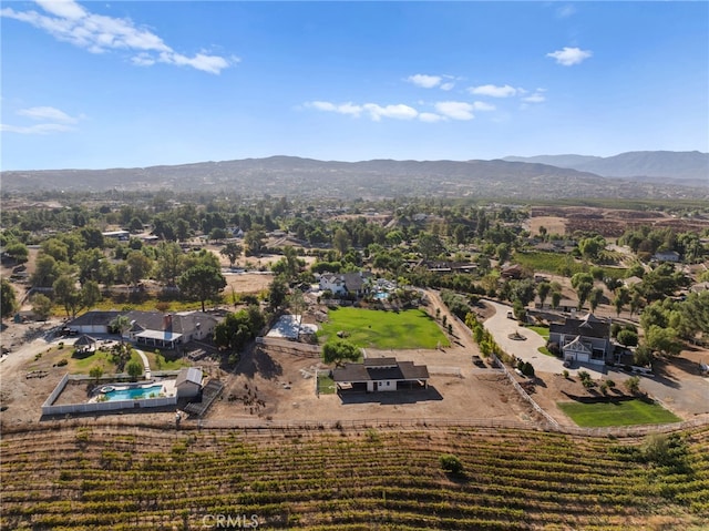 bird's eye view featuring a rural view and a mountain view